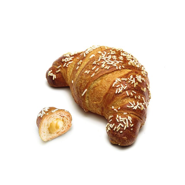 Croissant auriu cu stropi albi, alături de o bucată mai mică tăiată, cu umplutură cremoasă de vanilie.