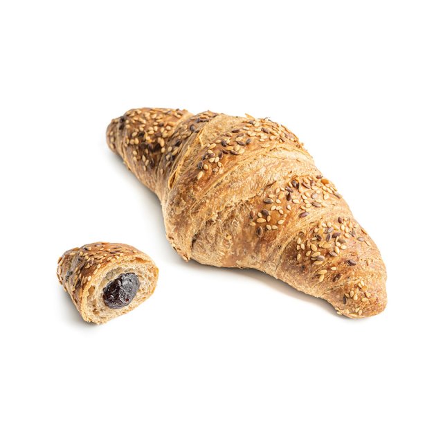 Croissant multicereale cu semințe de susan, alături o bucată mai mică tăiată cu umplutură de ciocolată neagră.