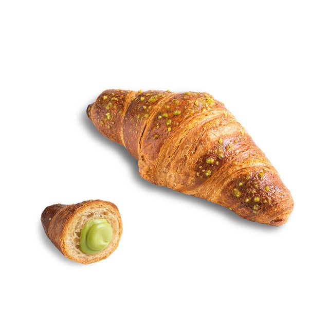 Croissant auriu cu crumble de fistic, cu o bucată mai mică tăiată, dezvăluind crema verde de fistic.